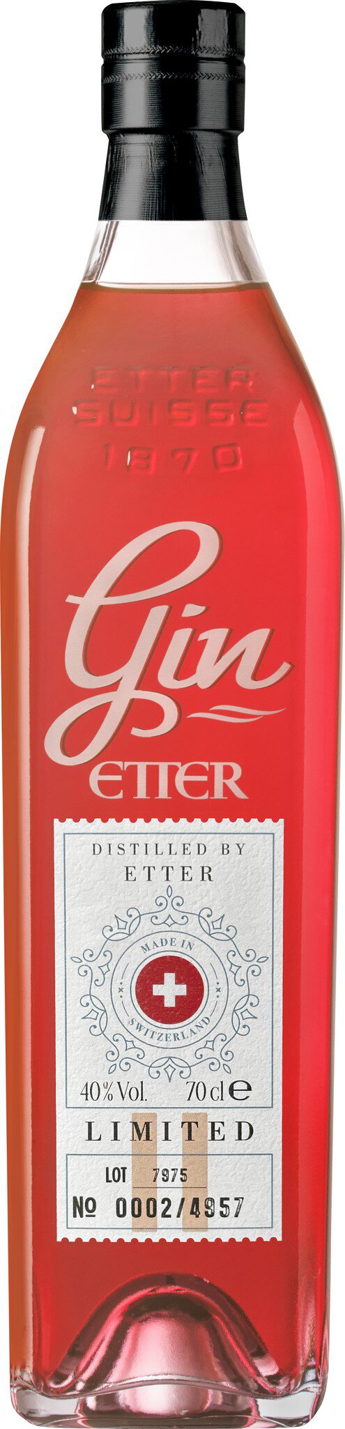 Eine Flasche rosa Gin mit schwarzem Deckel steht aufrecht. Das Etikett zeigt eine stilisierte Schrift und eine grafische Darstellung, umrahmt von einem hellen Hintergrund.