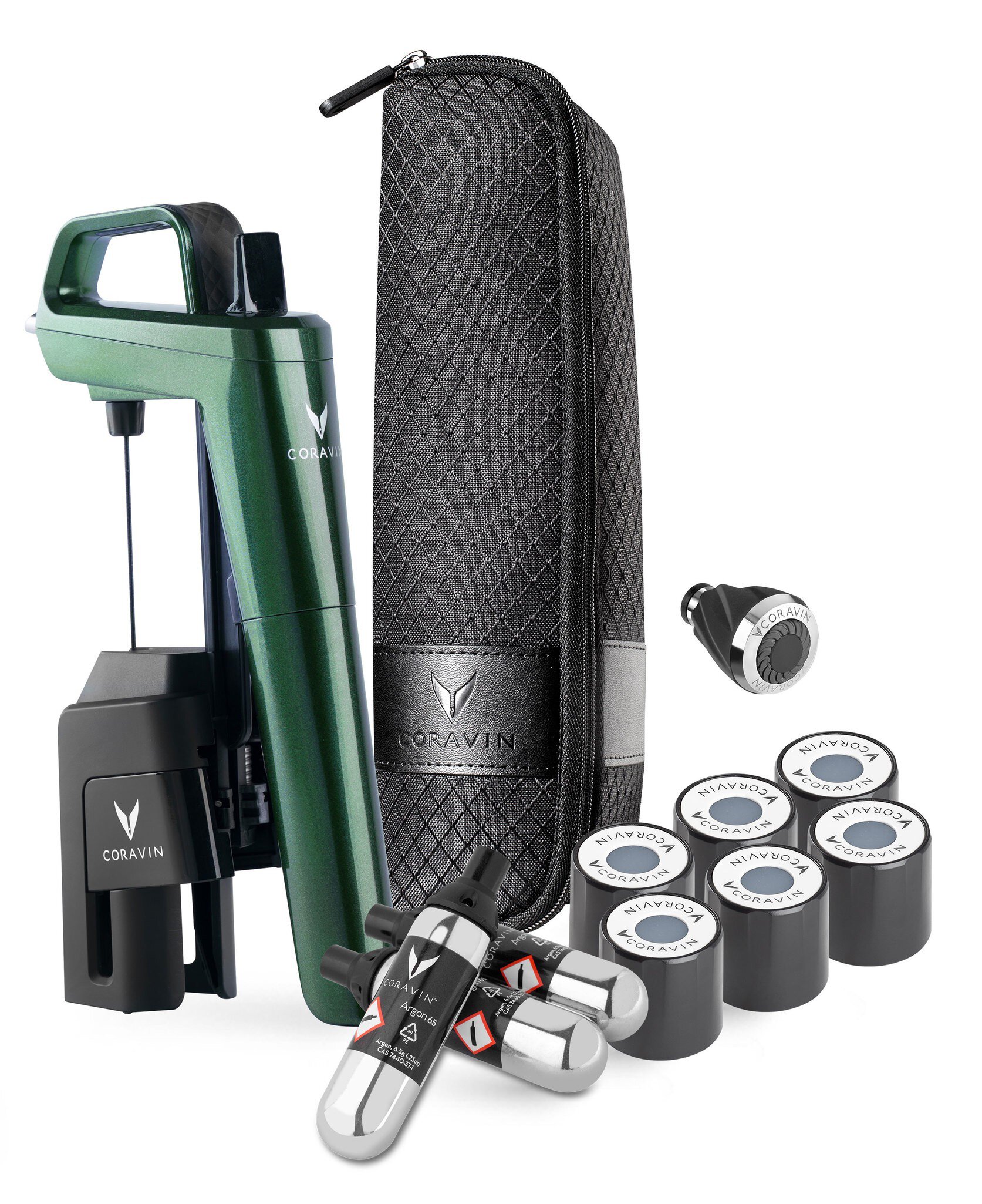 Ein schwarzen und grünen Handgerät steht aufrecht, daneben liegen mehrere metallische Zylinder und ein weiteres kleines Gerät. Es scheint sich um ein Werkzeugset zu handeln, möglicherweise für eine spezifische Anwendung.