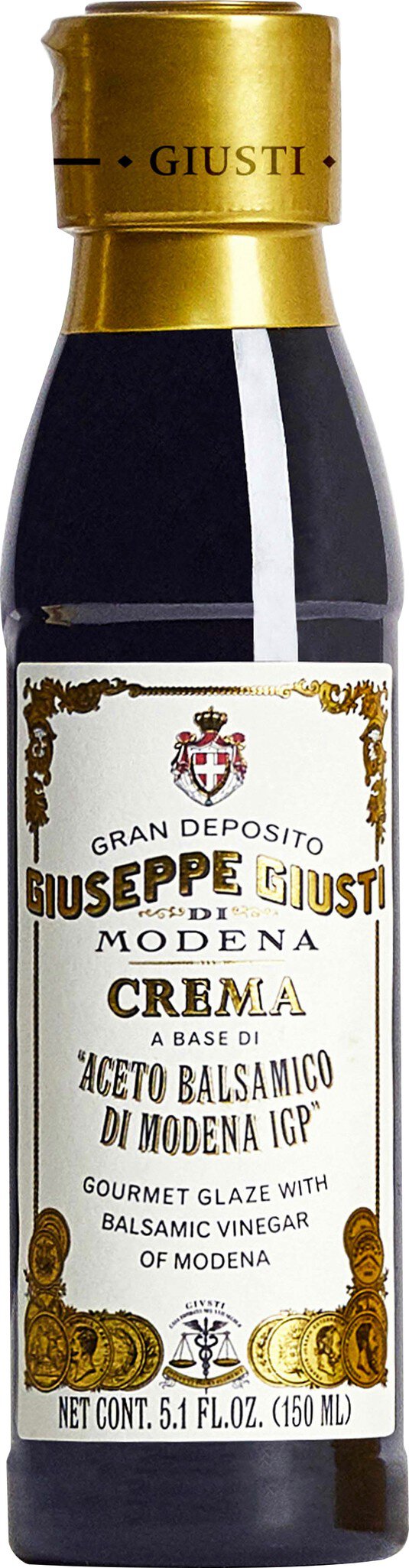 Ein Glasflasche mit dunkler Flüssigkeit, die eine Art Essig oder Öl darstellt. Die Flasche hat eine goldene Kappe und ein Etikett mit Schriftzug und dekorativem Design.