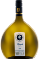 Eine große, runde Flasche mit grünlich-transparentem Glas steht auf einer weißen Fläche. Der Flaschenhals ist schmal und mit einem schwarzen Verschluss versehen. Ein etikett ist sichtbar.