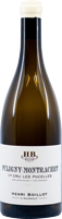 Eine Weinflasche mit einem eleganten, schlanken, dunklen Glasdesign. Die Etikette zeigt den Namen -Puligny-Montrachet-, sowie -Henri Boillot- und andere Details in stilvoller Schrift.
